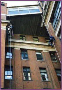 Precision Abseiling - Specialist Rope Access and Building Maintenance- Men at Work